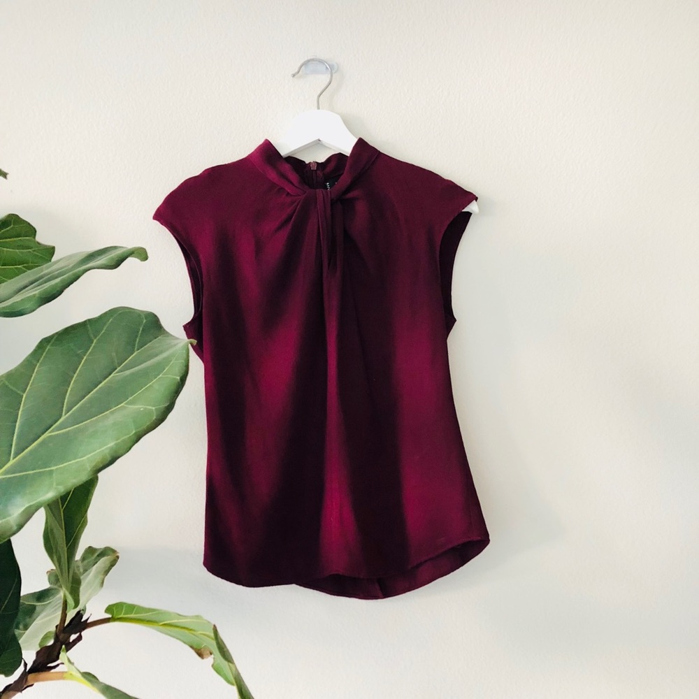 Dark purple blouse w/ knot neck detail cap sleeves